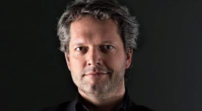 Guido den Aantrekker: van schrijver/ journalist/ contentmaker naar hoofdredacteur van Story